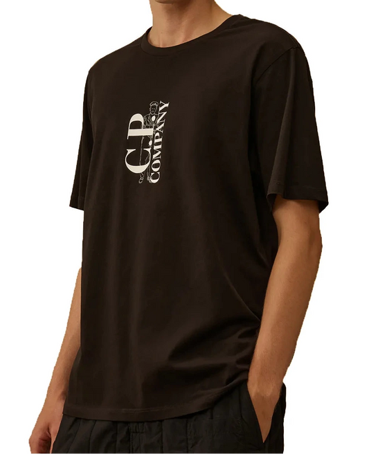 Person wearing a CP Company t-shirt with a logo on a white background