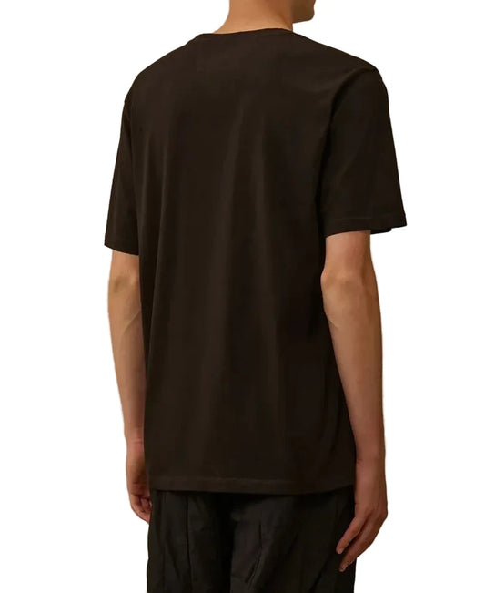 Person wearing a black CP Compnay t-shirt 