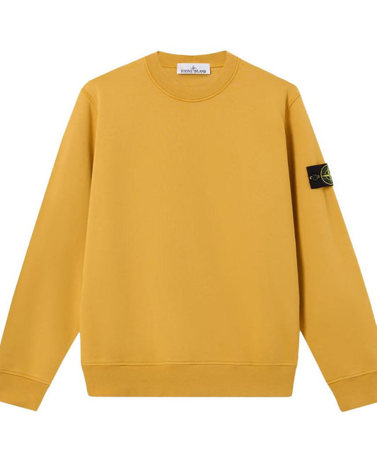 A yellow crewneck sweatshirt with a Stone Island compass patch on the left sleeve, displayed against a plain white background.