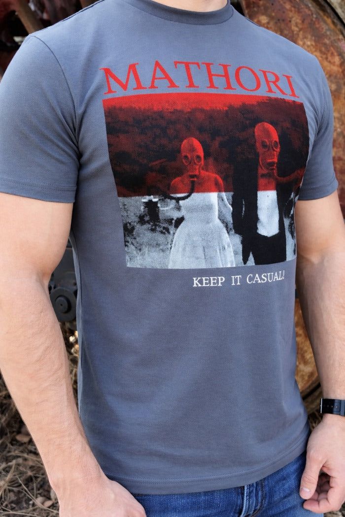 Person wearing a t-shirt with 'Mathori' design and text.