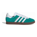 Green Adidas sneaker with white stripes on a white background
