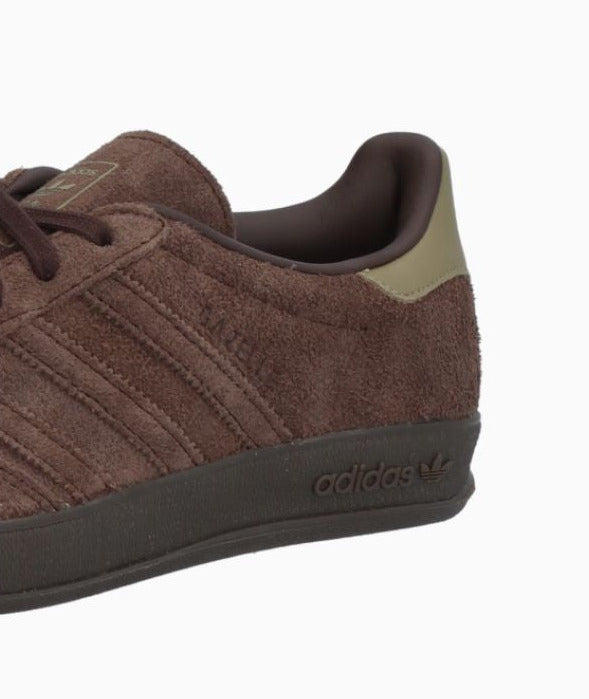 Brown Adidas sneaker on a white background