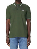 Person wearing a green Boss polo shirt with a brand logo on a white background