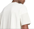 Man wearing a white t-shirt on a white background