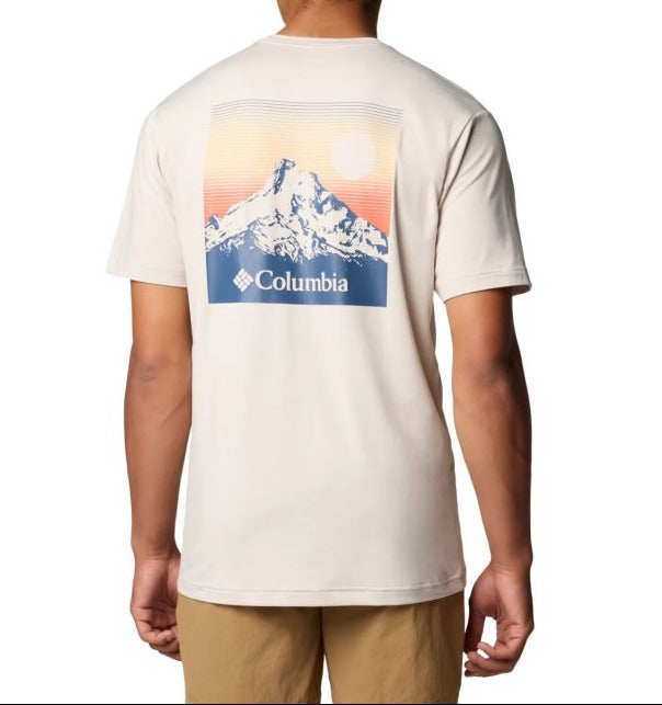 Person wearing a cream-colored t-shirt with a mountain graphic and Columbia logo on the back.