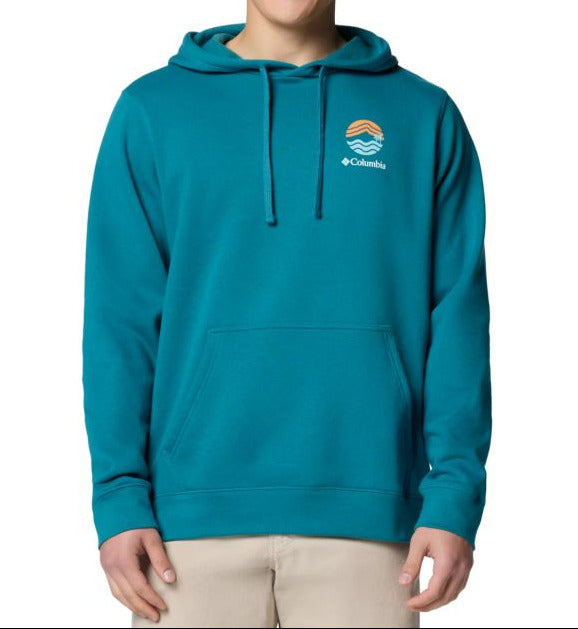 Person wearing a teal hoodie with a logo on a white background