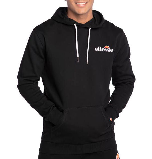 Man wearing a black hoodie with 'ellesse' logo on a white background