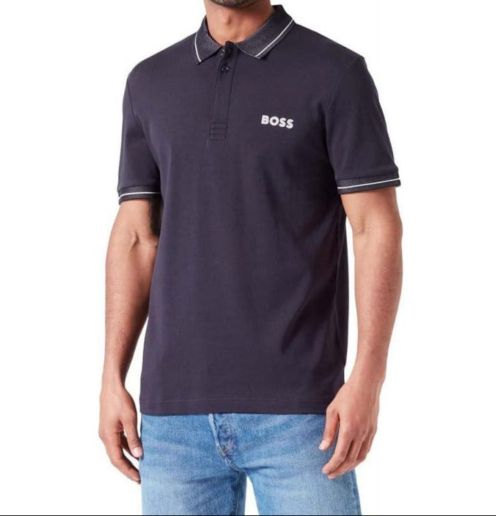 Man wearing a navy blue polo shirt with 'BOSS' logo on a white background