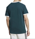 Person wearing a dark green t-shirt with white trim on a white background
