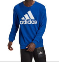Person wearing a blue Adidas sweatshirt on a white background