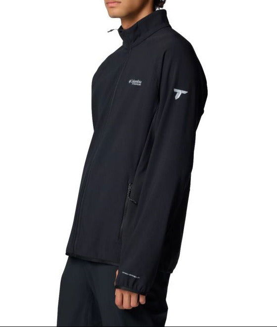 Person wearing a black jacket with a brand logo on a white background