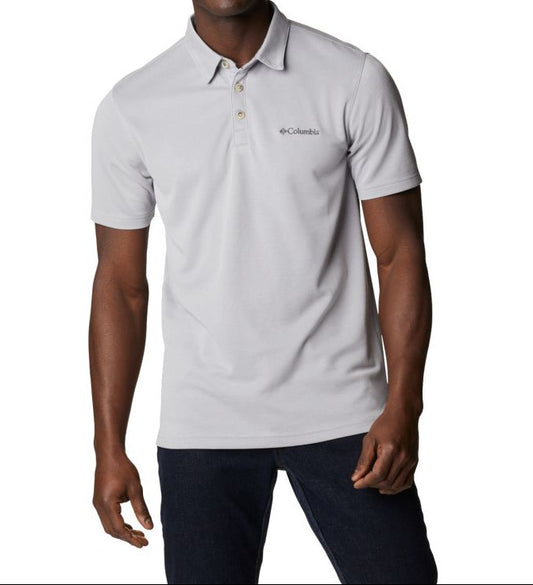 Man wearing a light gray polo shirt with Columbia logo on a white background