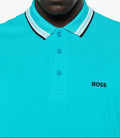 Turquoise polo shirt with white collar and black 'BOSS' logo on a white background