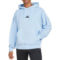 Man wearing a light blue hoodie with Adidas logo on a white background