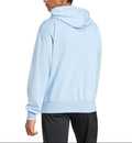 Person wearing a light blue hoodie on a white background