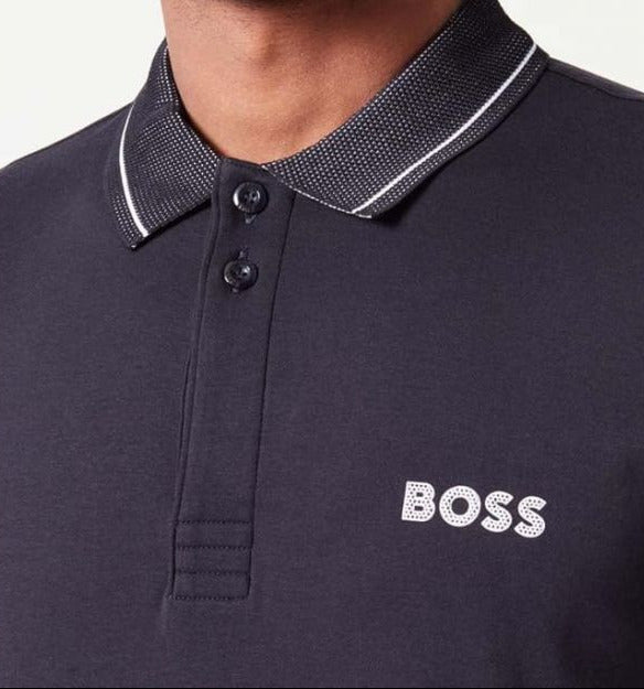 Navy blue polo shirt with 'BOSS' logo worn by a person