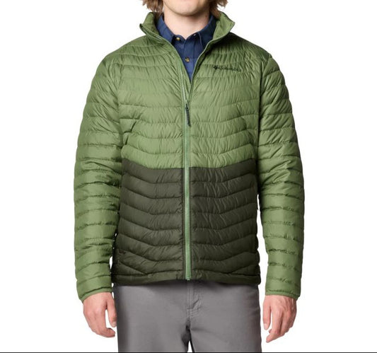 Man wearing a green puffer jacket on a white background